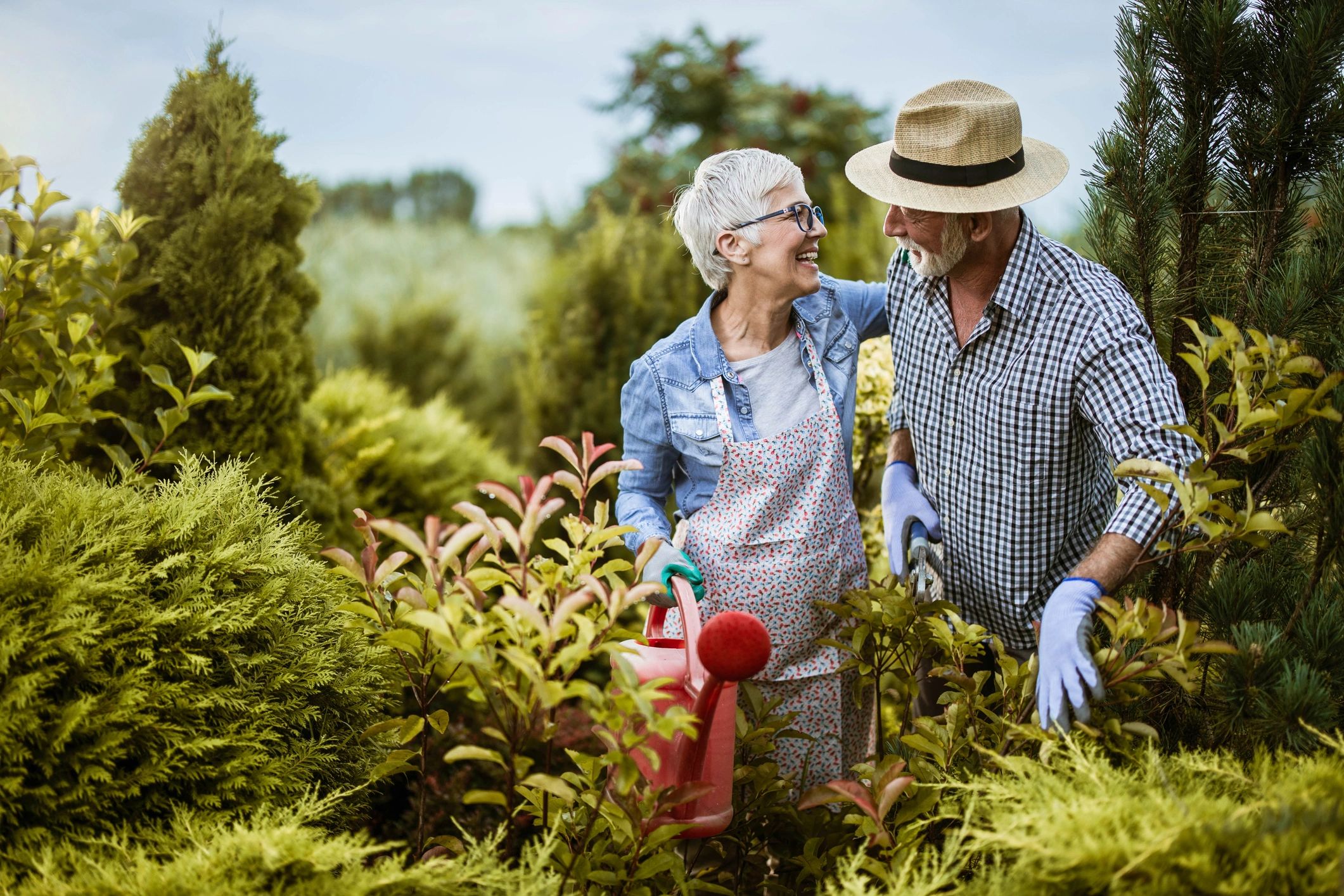 Smiling couple outdoors in a garden