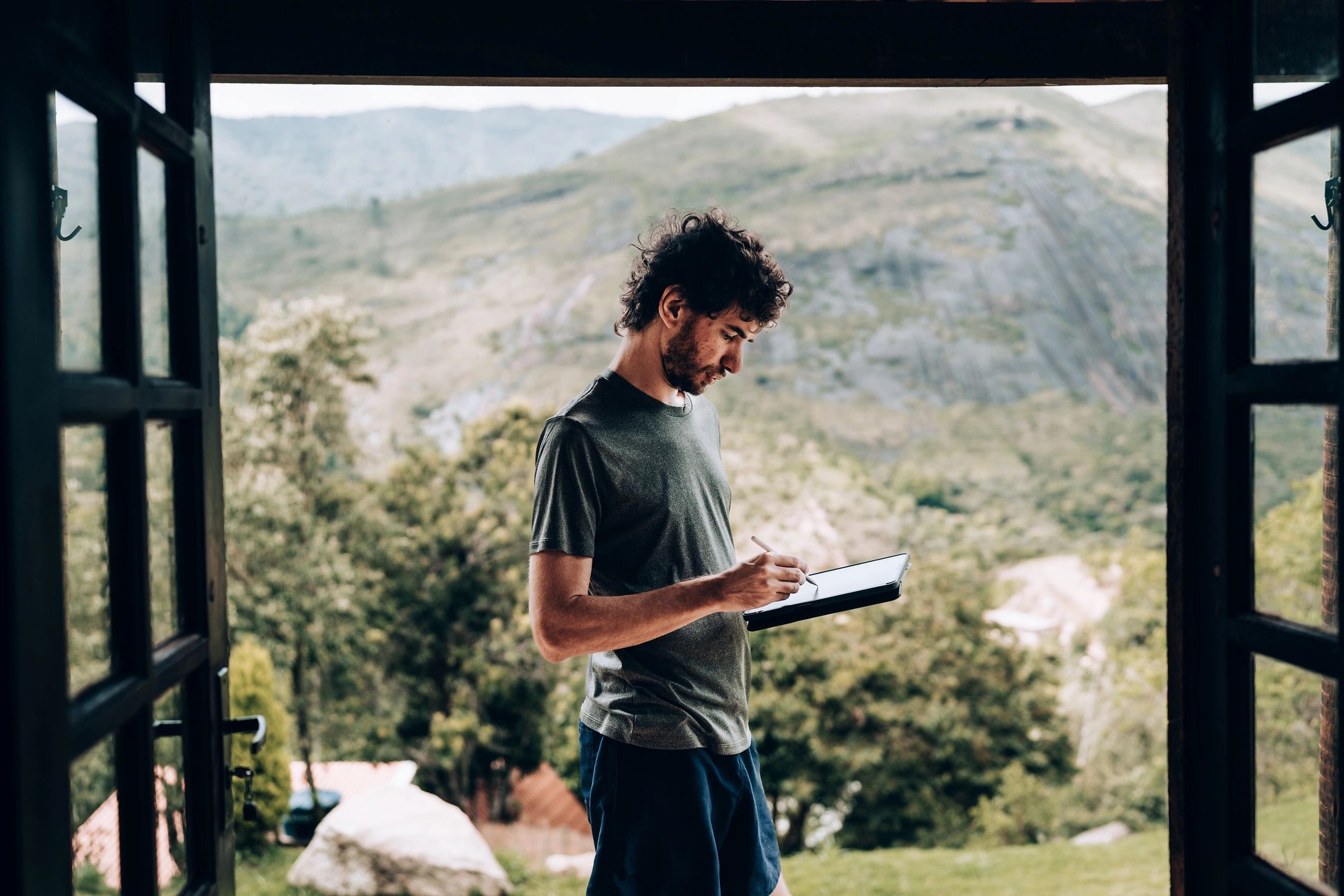 Landscape professional using a tablet for planning