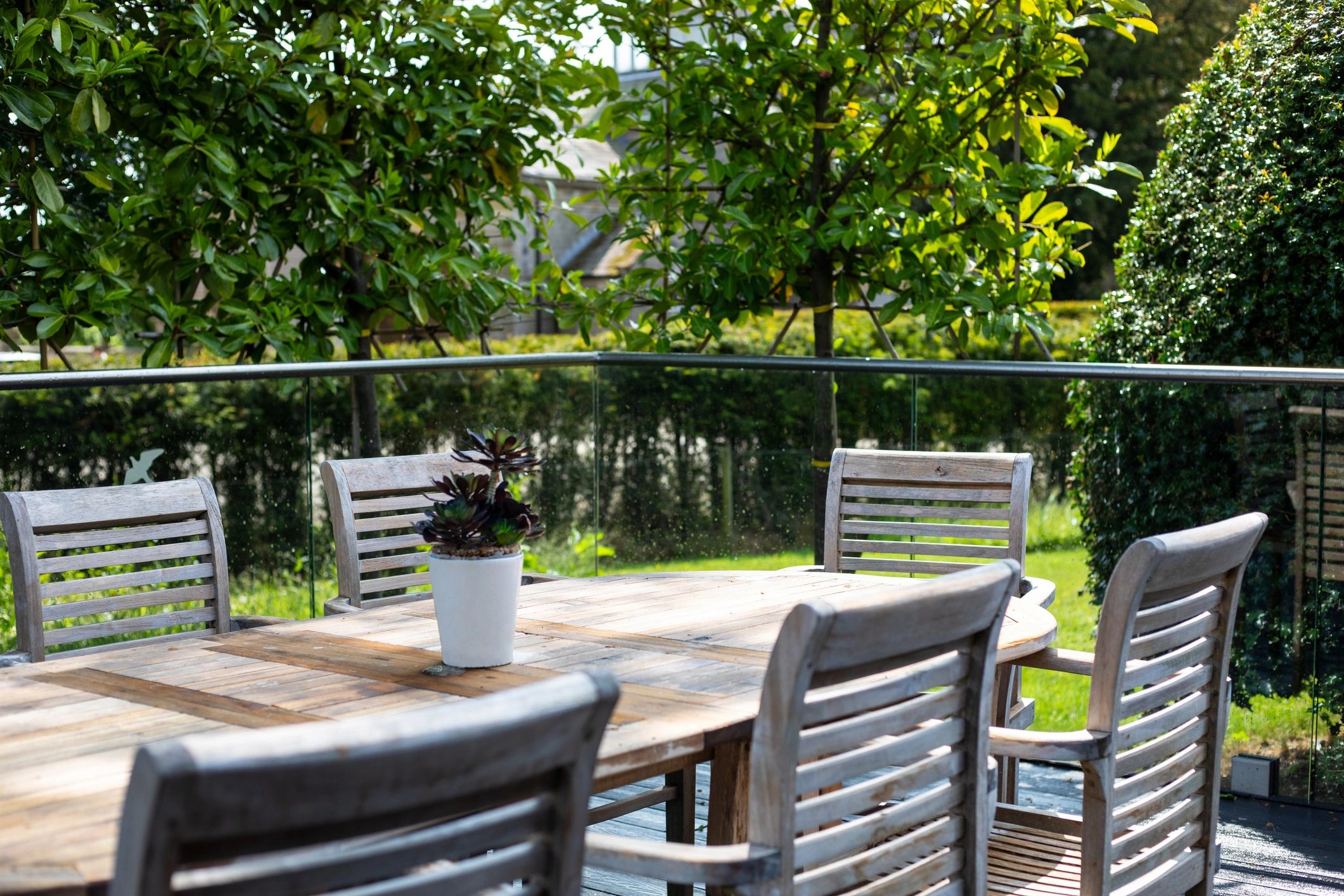 Outdoor seating area in a lush garden setting